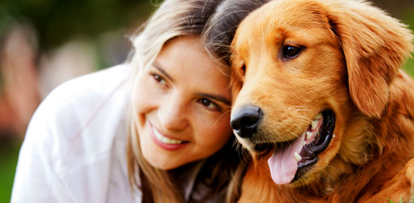 girl laying with dog